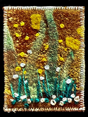 Artist trading card featuring an embroidered garden scene