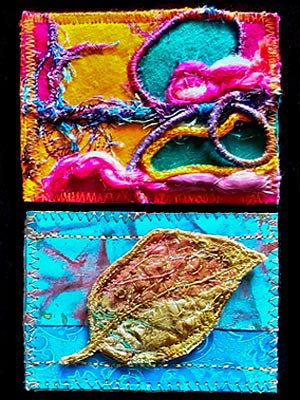 Artist trading cards, one with felting and threads in bright colours, the other a leaf on blue background