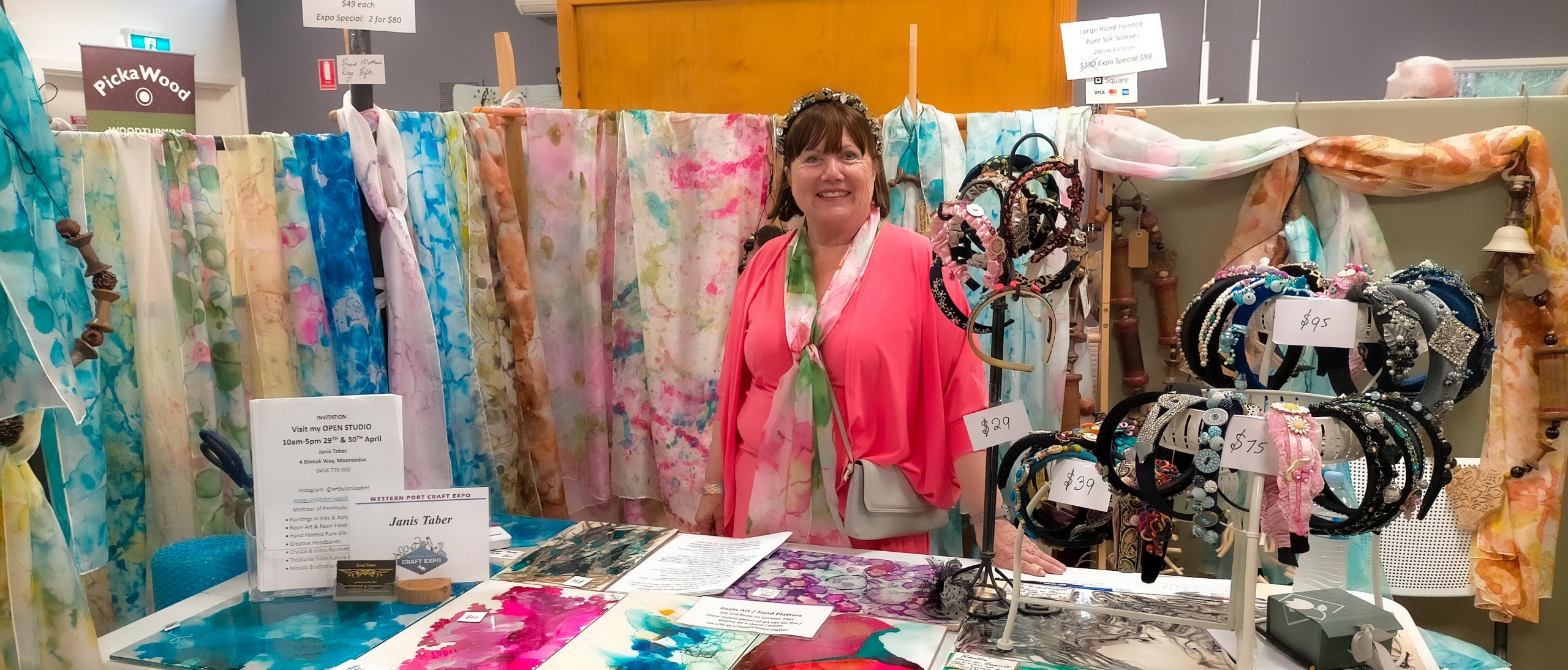 Jan Barbieri from the Peninsula Arts Textile Group, at Hastings Craft Expo, with hand crafted scarves, prints and accessories