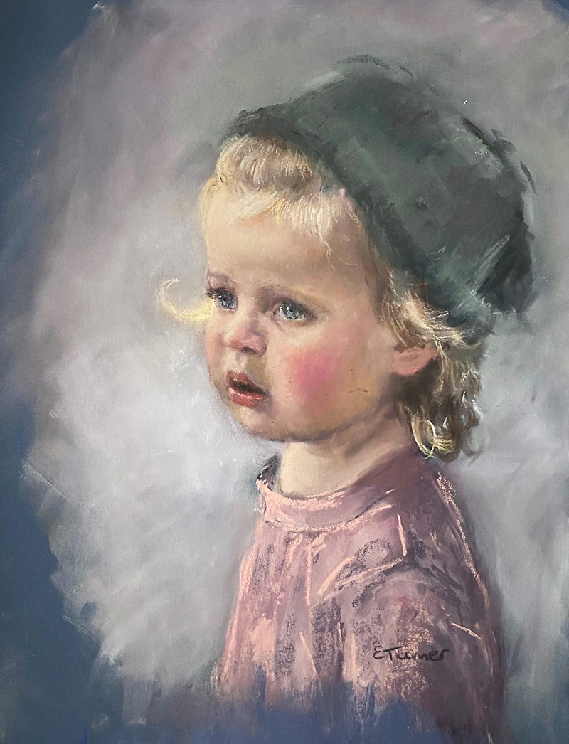 Portrait of a young blonde girl in a grey cap and pink top by Liz Turner