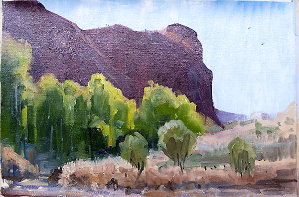 Demo oil painting of a landscape with rocky hill in background and sunlit trees in foreground, by Ben Winspear.