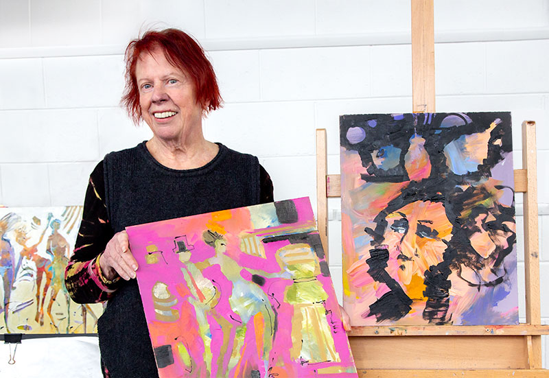 Susan O'Brien with her demonstration negative painting artworks