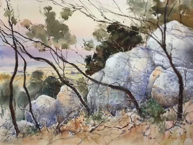 Annee Kelly - Ageless Beauty, the You Yangs - Watercolour landscape with large foreground rocks and dark saplings.