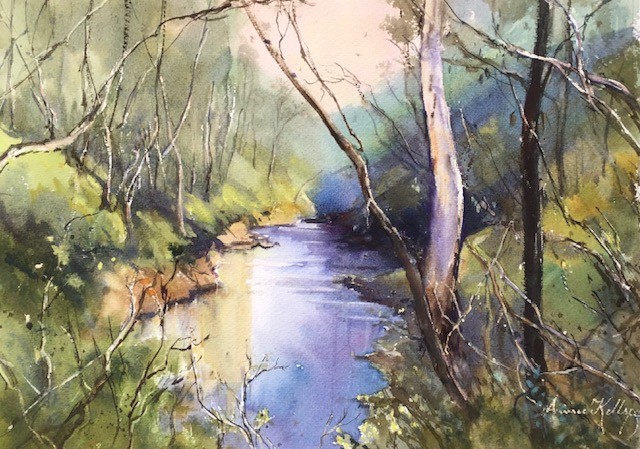 Annee Kelly - Watercolour of a river with dense bush and trees along the riverbank.