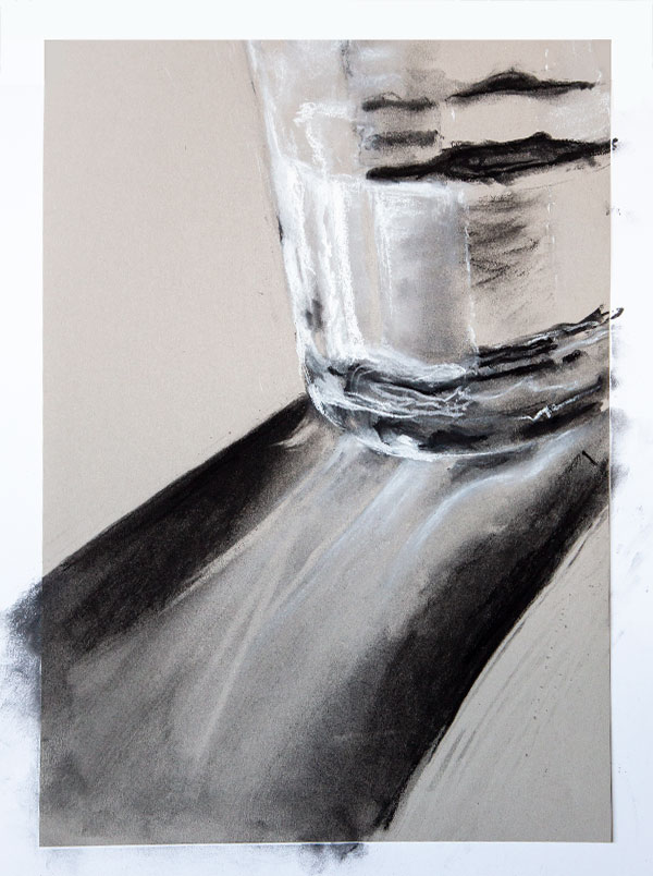 Adding highlight and shadow detail to a tonal drawing of a glass of water.