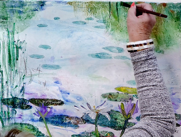 Painting in foliage with a brush.