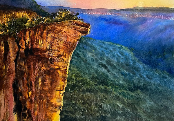 Rehann Vazid - 19 Minutes - Watercolour painting of a rugged cliff face with forested mountains in background.